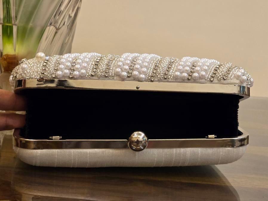 INAAYA PEARL CLUTCH