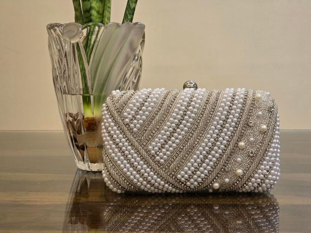 INAAYA PEARL CLUTCH