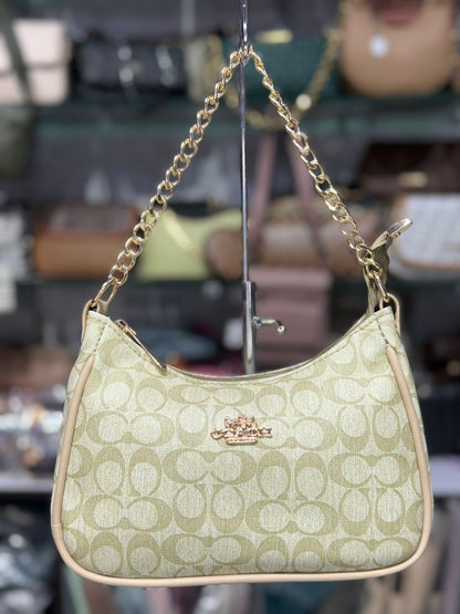 SIGNATURE SLING BAG